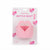 A pink heart-shaped bottle opener in its original retail blister packaging, featuring a white backing card decorated with pink hearts and the brand name 'Chair Cheerfuls'.