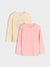 Two long-sleeve shirts, one beige and one pink, on a light gray background.