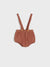 Brown baby bloomers with suspenders on a light gray background