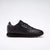Black Reebok sneaker on a white background