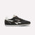 Black Reebok sneaker on a white background