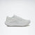 A Reebok running shoe in white, shown from a side profile view against a clean white background.