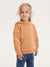 Child wearing a tan hoodie with a cashback 20% offer in the corner.