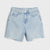 Light wash blue denim shorts with a distressed, frayed hem and a small rip on the left thigh, shown flat on a light gray background.