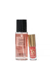 Victoria's Secret Bare Vanilla fragrance mist and lip gloss on a white background