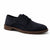 Navy suede shoe with brown sole on a white background