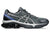 Gray running shoe with unique sole design on a white background