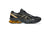 Black and gold running shoe with a visible brand logo on a white background