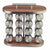Wooden and metal spice rack with cylindrical containers on a kitchen counter.