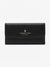A black leather clutch wallet with gold foil branding from the London Fog Collection, displayed against a clean white background.