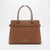 A brown leather handbag with a structured rectangular shape, featuring dual top handles wrapped in protective plastic, a horizontal strap detail across the front with gold-tone hardware, and the 'LONDON FOOD COLLECTION' logo printed in gold at the bottom center.