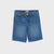 Blue denim shorts on a white background