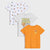 Three kids' short-sleeve t-shirts arranged in a layered flat lay on a light gray background. The top shirt is white with a repeating cartoon dog print.