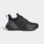 Black athletic shoe with a white background