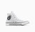 White high-top sneaker with black sole on a white background