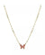 Necklace with a pink butterfly pendant on a gold chain against a white background