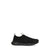 A single black slip-on mesh sneaker shown in profile against a solid white background.