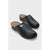 A pair of black leather clogs with a small silver button detail on the front, displayed on a light gray background.