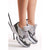 A pair of chunky low-top sneakers in gray, white, and black, shown on a model's feet against a clean white background.