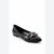A black leather flat shoe with a chunky silver chain detail across the toe, shown on a plain white background.