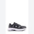 A black athletic sneaker with a white sole, featuring a mesh and synthetic upper, black laces, and a white embroidered horse logo on the side.