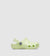 Light green clog shoe on a white background