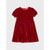 A red velvet tiered dress with short puff sleeves and a round neckline, displayed flat against a light gray background.