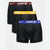 Three pairs of Nike men's boxer briefs in black, featuring maroon, yellow, and blue elastic waistbands with white Nike branding, displayed against a light gray background.