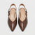 A pair of pointed-toe slingback pumps featuring a brown snakeskin pattern, shown from a top-down view on a light gray background. The brand name 'now day' is visible on the insoles.
