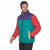 A man wearing a color-blocked puffer jacket with purple, teal, and red panels, yellow trim, and a black front zipper, photographed against a plain white background.