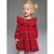 A young toddler girl wearing a red long-sleeve dress with a green and black plaid pattern, ruffled collar, and matching bow, standing against a solid gray studio background.