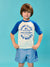 Child wearing a 'Surf Club' shirt and shorts on a blue background