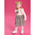 A toddler girl modeling a two-piece outfit consisting of a light pink long-sleeve top with a Minnie Mouse graphic and a black-and-white leopard print skirt, set against a solid pink background.