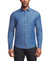 Man wearing a blue button-up shirt on a white background