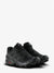 Black hiking shoes with visible brand logo on a white background