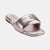 A metallic rose gold slide sandal with a square toe and a debossed logo on the strap, shown against a light gray background.