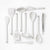 A set of white silicone kitchen utensils with silver metal tongs, arranged neatly on a clean white background.