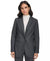 Woman wearing a gray suit jacket on a white background