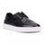 A black leather low-top sneaker with brogue detailing, black laces, and a thick white platform sole, shown from a three-quarters angle on a white background.