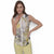 A woman modeling a sleeveless collared button-front blouse with an abstract painterly print in yellow, gray, white, and black, paired with pale yellow pants against a white studio background.
