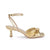 A single metallic gold heeled sandal with crisscrossing straps and an ankle strap, shown from a side profile on a white background.
