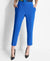 Person wearing blue pants on a white background