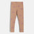 A pair of children's leggings in a dusty rose-beige color, featuring an all-over pattern of small pink bows outlined in darker pink, shown flat against a light gray background.