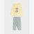 A two-piece children's pajama set featuring a pale yellow long-sleeve top with a cartoon bear graphic and text, paired with light blue pants covered in a pink bear print, displayed on a light gray background.