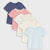 A set of five children's short-sleeve t-shirts in various patterns and colors, including navy blue with white polka dots, red and white stripes, white with tiny blue prints, cream, and light blue, arranged on a light gray background.