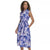 Woman wearing a blue floral dress on a white background
