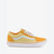 A classic low-top Vans sneaker in a yellow and light yellow colorway, featuring a white side stripe, white laces, and a white rubber sole, shown from a side profile on a light gray background.