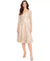 Woman wearing a beige lace dress on a white background