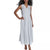 A woman modeling a sleeveless wrap-style maxi dress with vertical pinstripes on a plain white background.