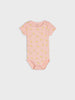 Pink baby bodysuit with yellow patterns on a light gray background